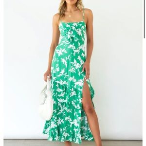 Green midi dress with ruffles and slit